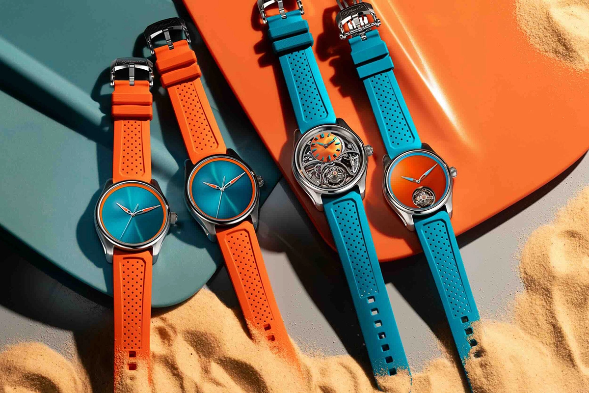 H_Moser_Pioneer_Spiced_Aqua_drei Uhren_Lifestyle.jpg H. Moser & Cie. Pioneer Spiced Aqua, drei Uhren mit Taucherflossen im Hintergrund