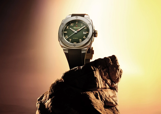 Alpina Alpiner Extreme Automatic California Dial, Uhr mit grünem Zifferblatt auf Felsen