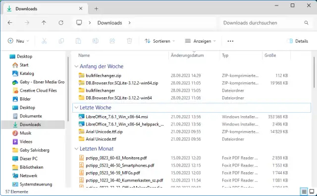 Ein Explorer-Fenster zeigt den Downloads-Ordner nach Zeitspanne gruppiert