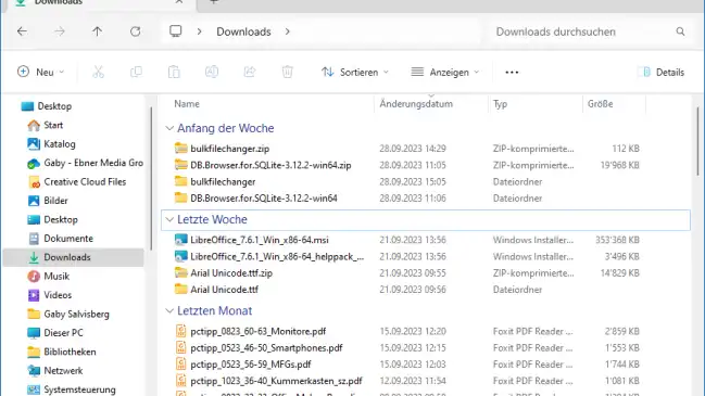 Ein Explorer-Fenster zeigt den Downloads-Ordner nach Zeitspanne gruppiert