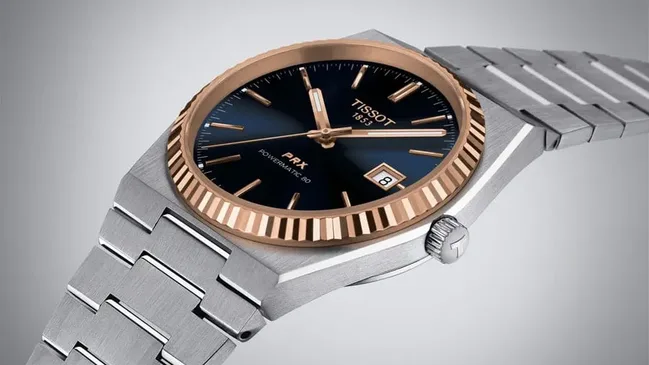 Tissot: PRX Powermatic 80 Stahl & Gold mit blauem Zifferblatt