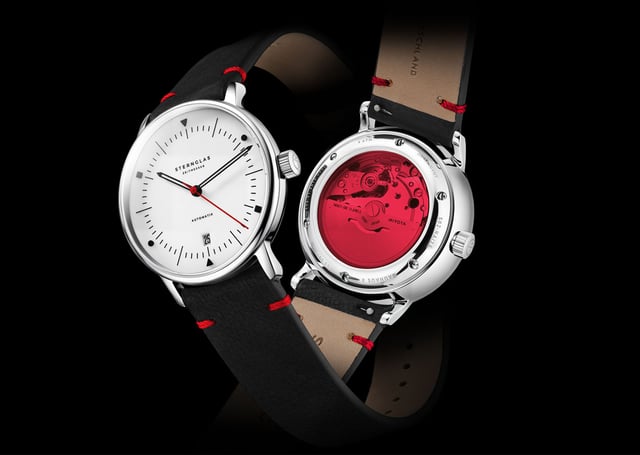Sternglas: Naos Automatik Edition Bauhaus X mit roten Elementen