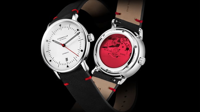 Sternglas: Naos Automatik Edition Bauhaus X mit roten Elementen