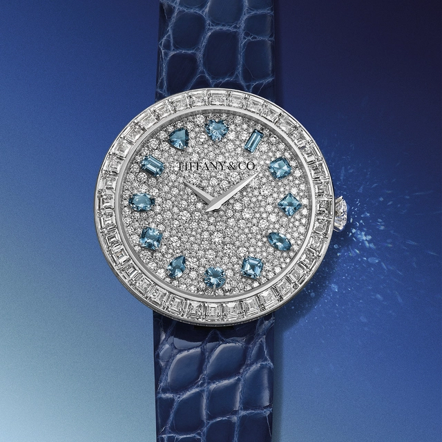 36 mm Eternity Baguette Watch by Tiffany in 18k white gold with aquamarines and diamonds.