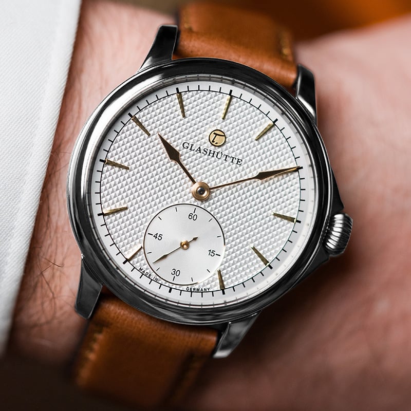 Tutima Patria 6612-09: Wristshot, Uhr am Handgelenk