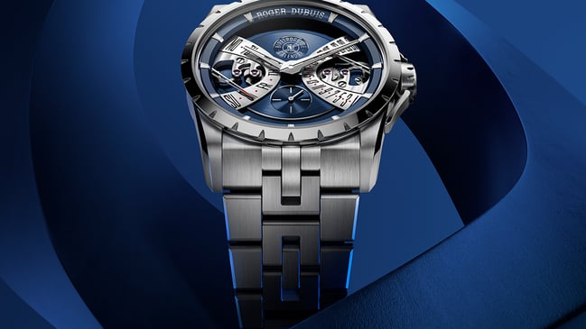 Roger Dubuis, Edelstahluhr mit Automatikwerk, blauem Zifferblatt und Kalenderfunktion