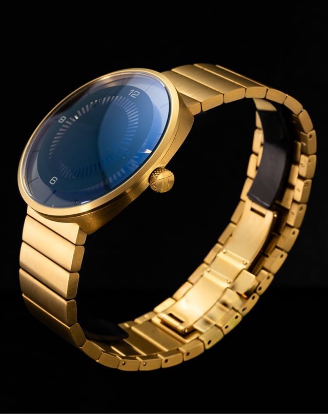 Botta – Clavius Aureus Automatik, elegante und reduzierte Uhr in Gold mit mattschwarzem Zifferblatt und besonderer Zeitanzeige