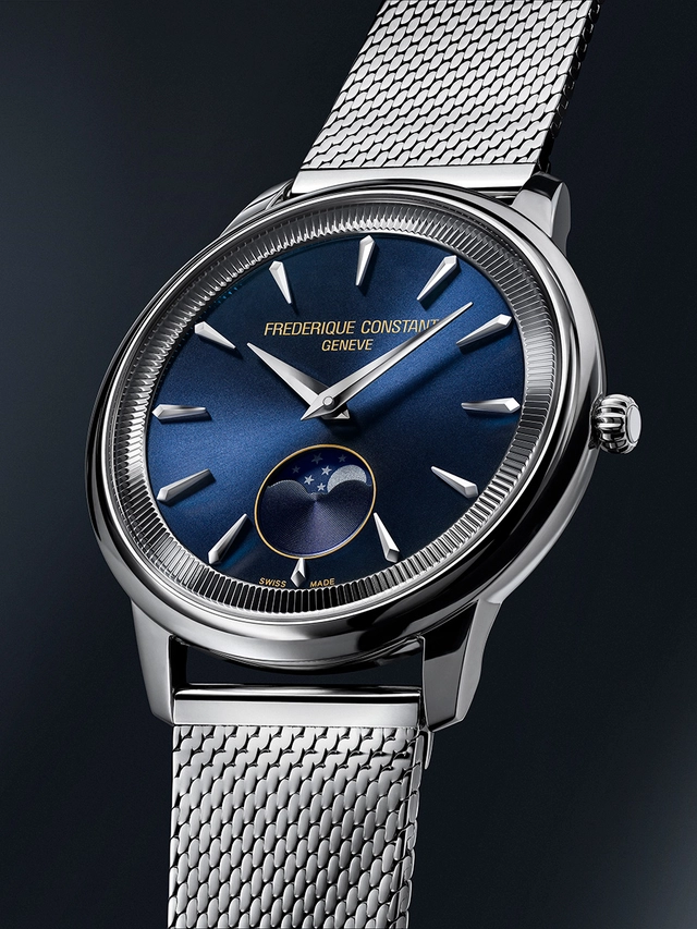 Frederique-Constant-Classics-Moneta-Moonphase-206N3S6B Stahlmodell und Milanaiseband vor dunklem Hintergrund